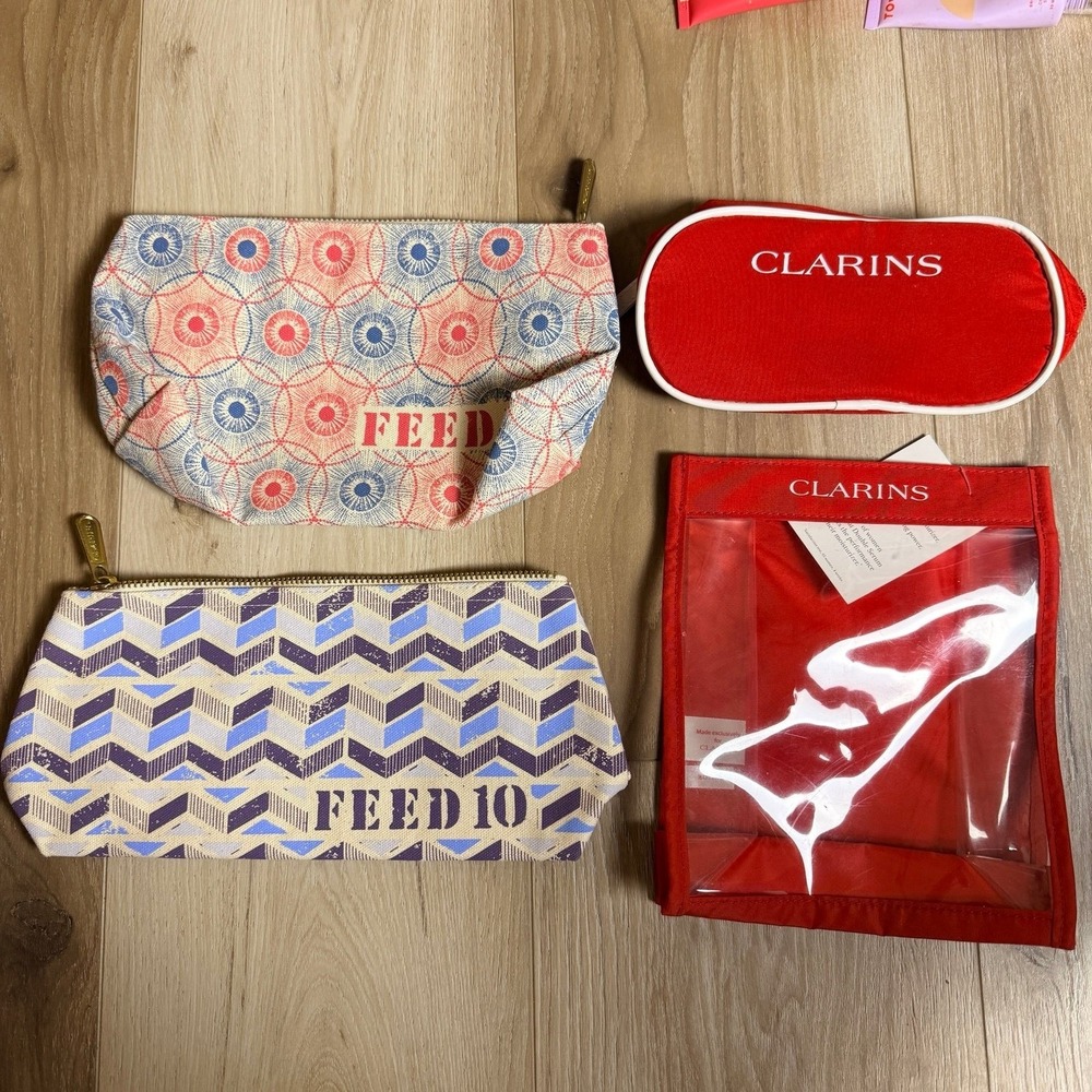 4 Clarins makeup bags vintage new